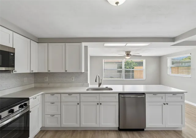 4th image of 11130 Tamarix Ave, Port Richey, FL 34668 | MLS# TB8513909