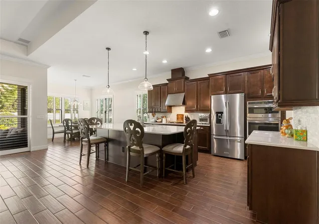 Photo 4 of Single family home for sale at 5134 Lakecastle Dr, Tampa, FL 33624 | MLS# TB8513935 | Listing updated on 2026-09-16