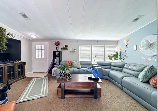 Photo 3 of Manufactured home for sale at 7519 Charlin Pkwy, Orlando, FL 32822 | MLS# O6412295 | Listing updated on 2026-09-15