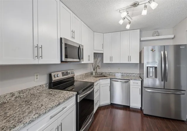 Photo 3 of Condo for sale at 5727 Biscayne Ct #209, New Port Richey, FL 34652 | MLS# OM725742 | Listing updated on 2026-10-03