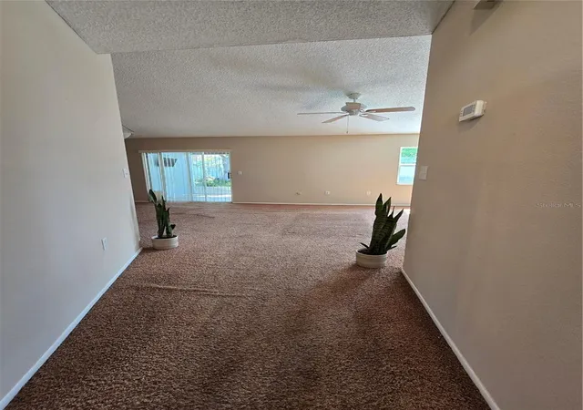 Photo 3 of Single family home for sale at 9836 Morehead Ln, Port Richey, FL 34668 | MLS# TB8514119 | Listing updated on 2026-08-09