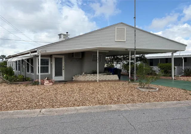Photo 2 of Manufactured home for sale at 5066 Pebble Beach Ave, Sarasota, FL 34234 | MLS# A4695438 | Listing updated on 2026-08-31