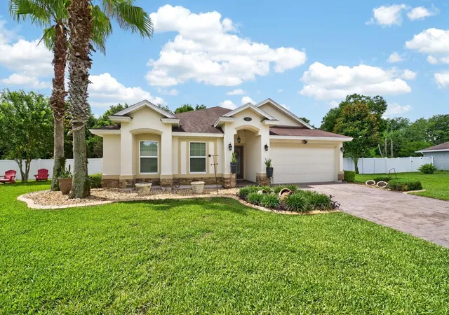 1st image of 53 Auberry Dr, Palm Coast, FL 32137 | MLS# FC318926