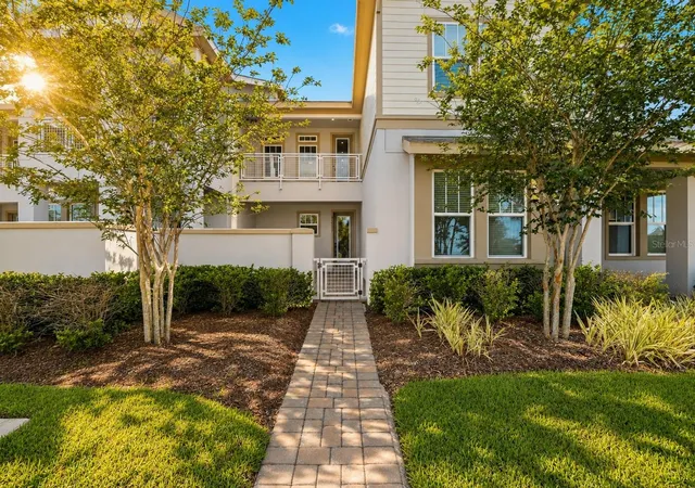 Photo 1 of Townhouse for sale at 7227 Nemours Pkwy, Orlando, FL 32827 | MLS# O6412368 | Listing updated on 2026-09-05