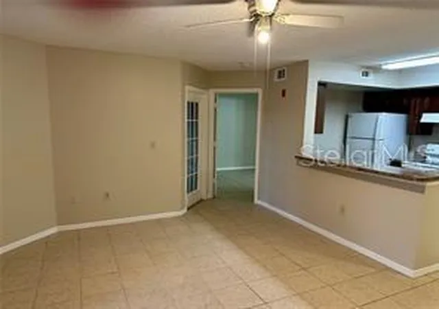 Photo 3 of Condo for sale at 401 Fountainhead Cir #155, Kissimmee, FL 34741 | MLS# S5150963 | Listing updated on 2026-08-31