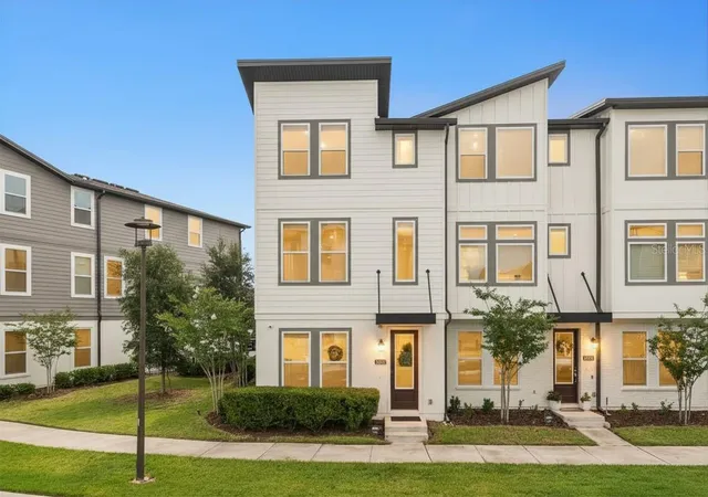Photo 1 of Townhouse for sale at 12551 Willstatter Ave, Orlando, FL 32827 | MLS# O6412387 | Listing updated on 2026-07-03