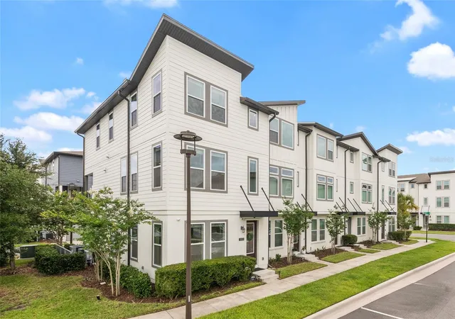 Photo 3 of Townhouse for sale at 12551 Willstatter Ave, Orlando, FL 32827 | MLS# O6412387 | Listing updated on 2026-07-03