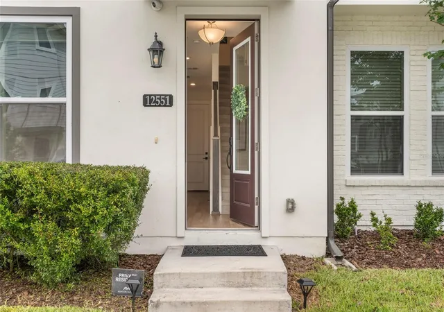 Photo 3 of Townhouse for sale at 12551 Willstatter Ave, Orlando, FL 32827 | MLS# O6412387 | Listing updated on 2026-07-03