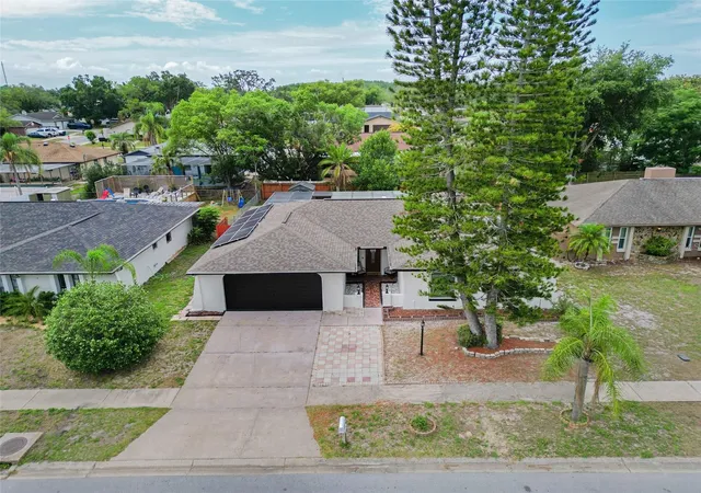 Photo 3 of Single family home for sale at 10951 Peppertree Ln, Port Richey, FL 34668 | MLS# TB8514264 | Listing updated on 2026-10-01