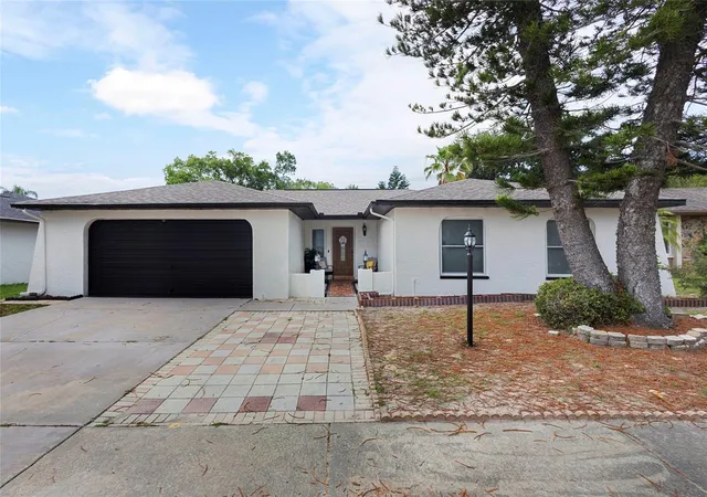 Photo 2 of Single family home for sale at 10951 Peppertree Ln, Port Richey, FL 34668 | MLS# TB8514264 | Listing updated on 2026-10-01