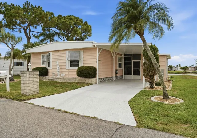 Photo 2 of Manufactured home for sale at 520 Imperial Dr, North Port, FL 34287 | MLS# C7526807 | Listing updated on 2026-08-30