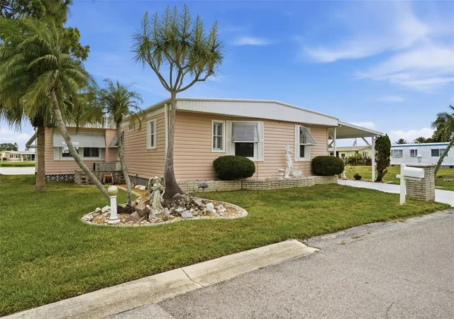 Photo 1 of Manufactured home for sale at 520 Imperial Dr, North Port, FL 34287 | MLS# C7526807 | Listing updated on 2026-08-30