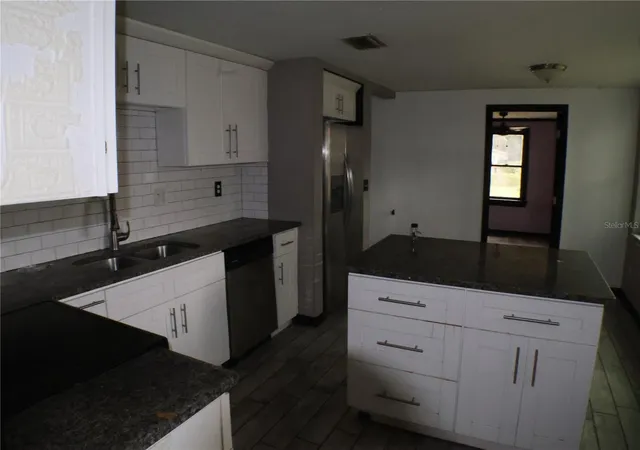 Photo 4 of Single family home for sale at 1202 N Ferrell St, Plant City, FL 33563 | MLS# A4695546 | Listing updated on 2026-09-28