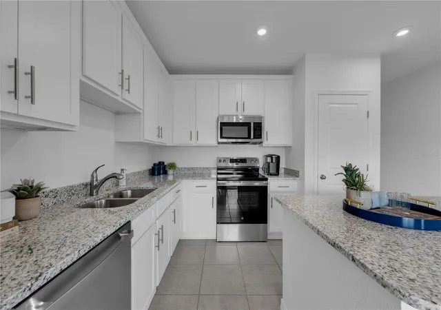 Photo 4 of Townhouse for sale at 1928 Fan Palm Dr, Davenport, FL 33897 | MLS# O6412652 | Listing updated on 2026-09-21