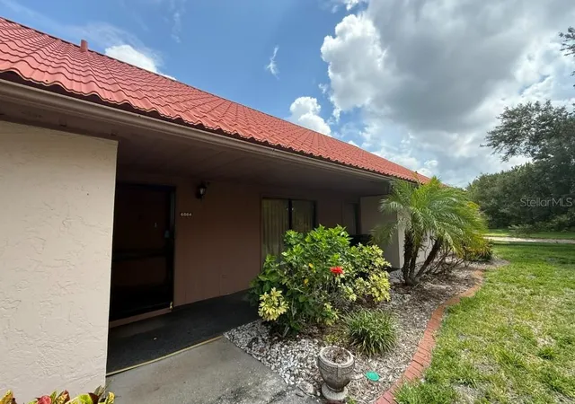 Photo 1 of Condo for sale at 6564 Draw Ln #102, Sarasota, FL 34238 | MLS# A4695561 | Listing updated on 2026-06-18