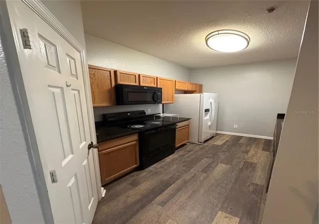 Listing Photo 5 - Condo for sale in building located at 6100 Stevenson Dr, Orlando, FL 32835 - Unit #207