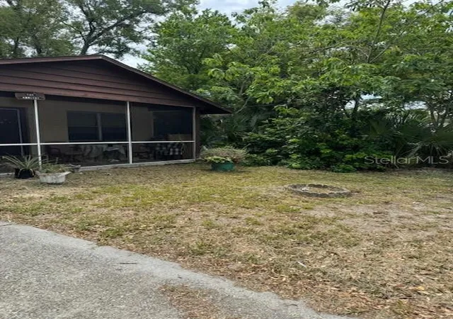 Photo 3 of Single family home for sale at 8609 N 13th Street, Tampa, FL 33604 | MLS# TB8514657 | Listing updated on 2026-06-10