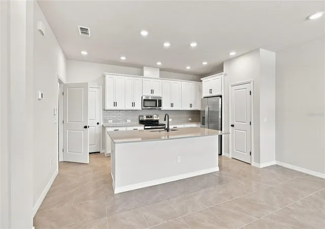 Photo 3 of Townhouse for sale at 5596 Coopers Hawk Ct, Saint Cloud, FL 34772 | MLS# TB8514711 | Listing updated on 2026-09-15