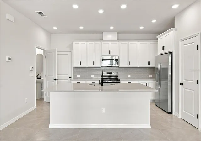 Photo 3 of Townhouse for sale at 5596 Coopers Hawk Ct, Saint Cloud, FL 34772 | MLS# TB8514711 | Listing updated on 2026-09-15
