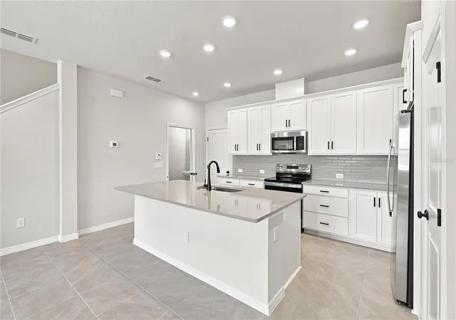 Photo 4 of Townhouse for sale at 5596 Coopers Hawk Ct, Saint Cloud, FL 34772 | MLS# TB8514711 | Listing updated on 2026-09-15
