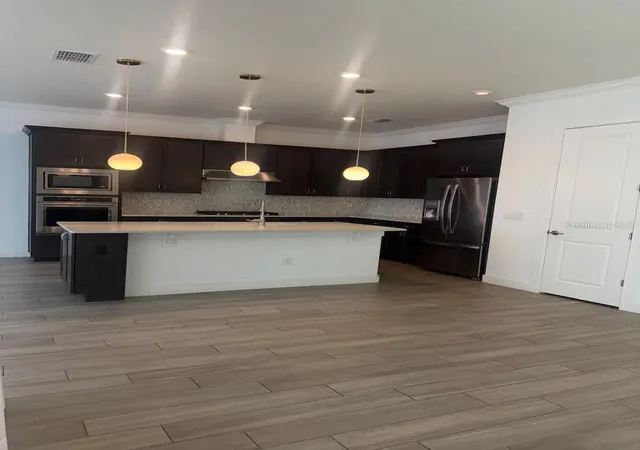 Photo 4 of Single family home for sale at 10732 Pahokee Beach Pl, Orlando, FL 32827 | MLS# O6412914 | Listing updated on 2026-10-06
