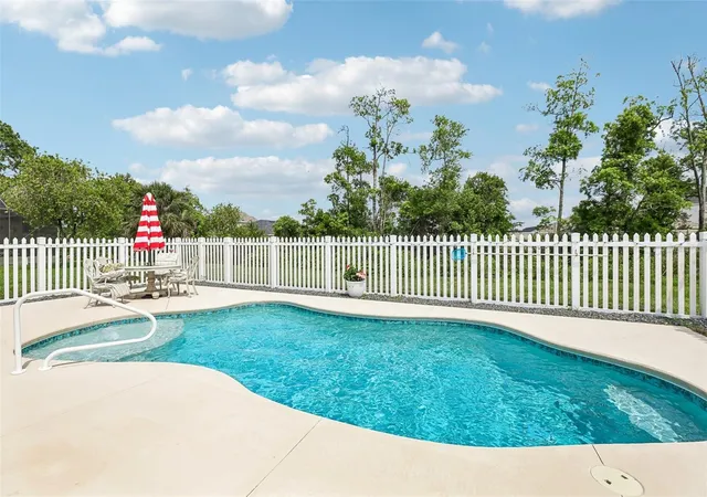 Photo 2 of Single family home for sale at 60 Woodbury Dr, Palm Coast, FL 32164 | MLS# O6412936 | Listing updated on 2026-09-19