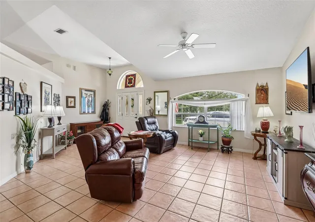 Photo 3 of Single family home for sale at 60 Woodbury Dr, Palm Coast, FL 32164 | MLS# O6412936 | Listing updated on 2026-09-19