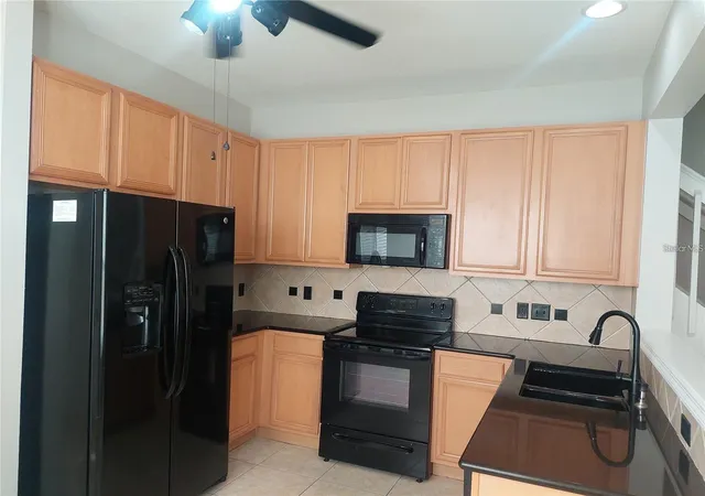 Photo 4 of Townhouse for sale at 6080 Twain St #106, Orlando, FL 32835 | MLS# S5151075 | Listing updated on 2026-08-20