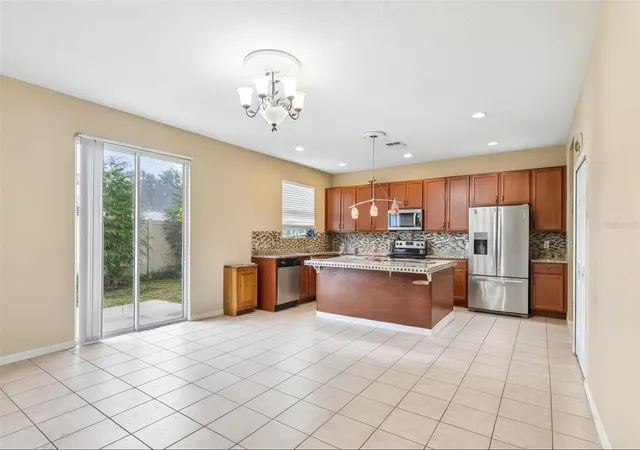 Photo 4 of Single family home for sale at 1585 Auburn Hills Ct, Tavares, FL 32778 | MLS# O6412949 | Listing updated on 2026-08-20