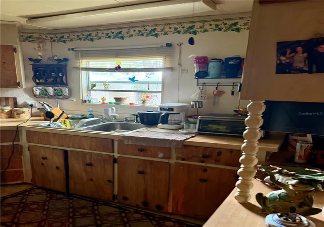 Photo 3 of Manufactured home for sale at 11710 Ne 222nd Lane, Fort Mc Coy, FL 32134 | MLS# OM725869 | Listing updated on 2026-06-12