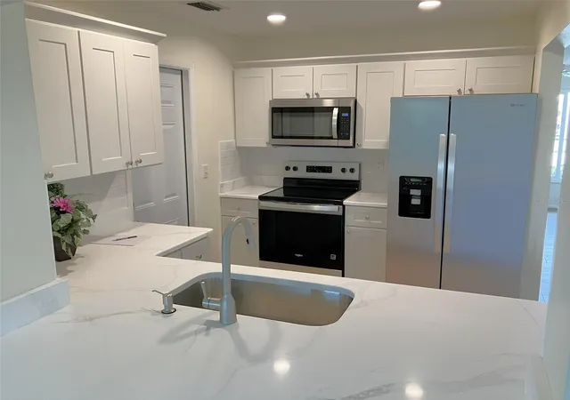 Listing Photo 4 - Condo for sale in building located at 10186 45th Wy N, PINELLAS PARK, FL 33782