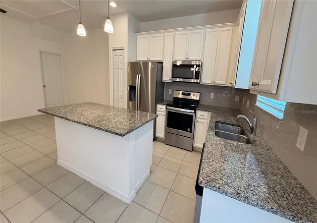 Photo 3 of Townhouse for sale at 6910 Tussilago Way, Orlando, FL 32822 | MLS# O6413208 | Listing updated on 2026-09-01