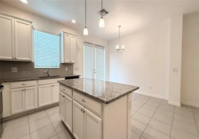 Photo 4 of Townhouse for sale at 6910 Tussilago Way, Orlando, FL 32822 | MLS# O6413208 | Listing updated on 2026-09-01