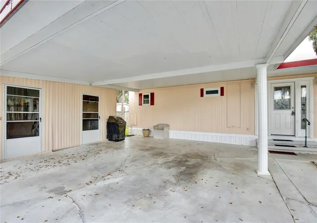 Photo 3 of Manufactured home for sale at 105 Cnl View, Eustis, FL 32726 | MLS# O6413223 | Listing updated on 2026-06-26