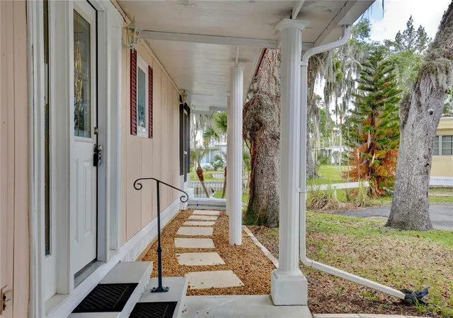 Photo 3 of Manufactured home for sale at 105 Cnl View, Eustis, FL 32726 | MLS# O6413223 | Listing updated on 2026-06-26