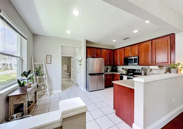 Photo 4 of Townhouse for sale at 1060 Rock Harbor Ave, Orlando, FL 32828 | MLS# O6413301 | Listing updated on 2026-09-01