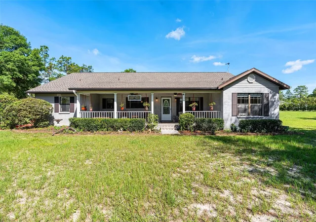 1st image of 10871 Se County Road 336, Morriston, FL 32668 | MLS# OM725937