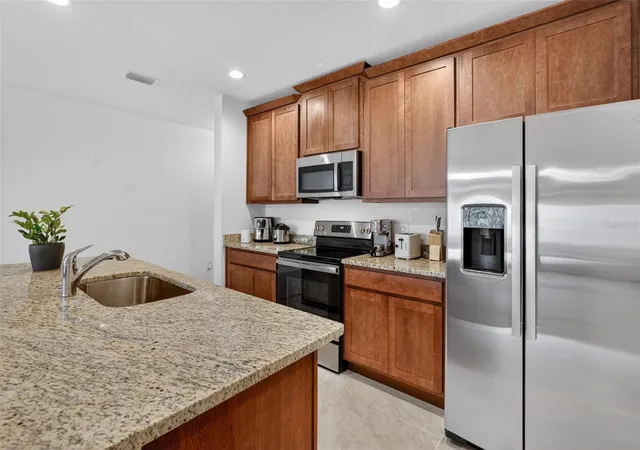 Photo 3 of Townhouse for sale at 1188 Woody Cypress Dr, Kissimmee, FL 34746 | MLS# O6413386 | Listing updated on 2026-09-12