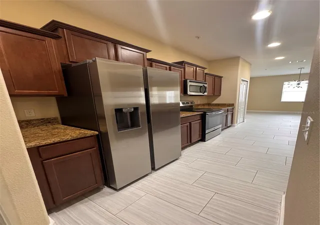 Photo 3 of Townhouse for sale at 15511 Campden St, Winter Garden, FL 34787 | MLS# O6413461 | Listing updated on 2026-08-26