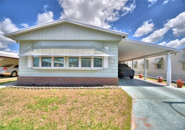 Photo 1 of Manufactured home for sale at 4158 Rolling Oaks Dr, Winter Haven, FL 33880 | MLS# P4938916 | Listing updated on 2026-07-21