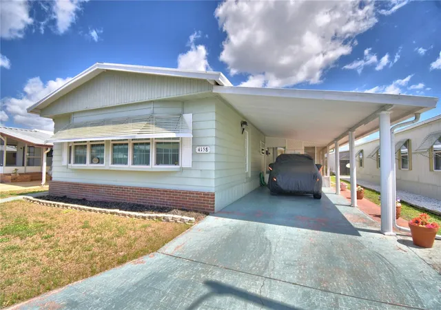 Photo 2 of Manufactured home for sale at 4158 Rolling Oaks Dr, Winter Haven, FL 33880 | MLS# P4938916 | Listing updated on 2026-07-21