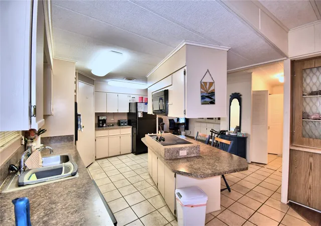 Photo 4 of Manufactured home for sale at 4158 Rolling Oaks Dr, Winter Haven, FL 33880 | MLS# P4938916 | Listing updated on 2026-07-21