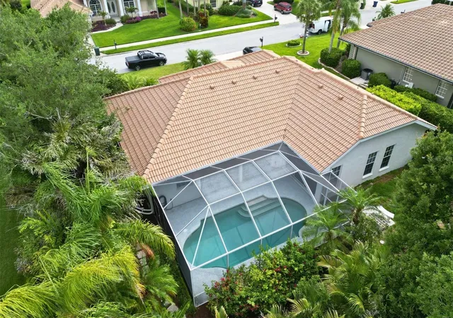 Photo 3 of Single family home for sale at 4824 Hanging Moss Ln, Sarasota, FL 34238 | MLS# A4695897 | Listing updated on 2026-08-18
