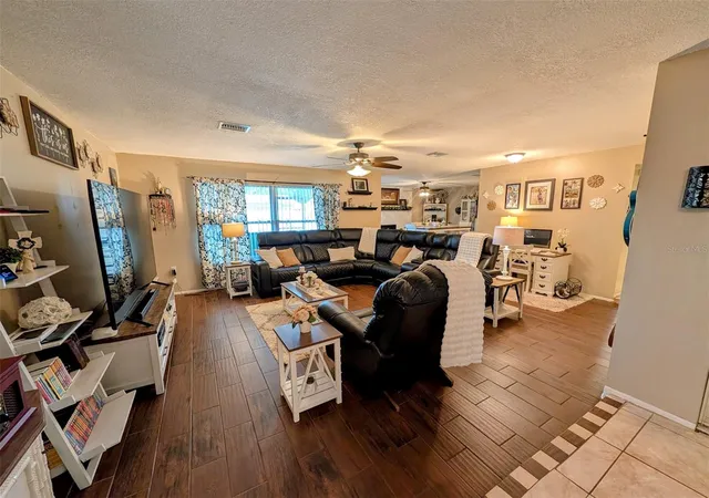 Photo 3 of Single family home for sale at 8240 Penwood Dr, Port Richey, FL 34668 | MLS# W7886385 | Listing updated on 2026-09-05