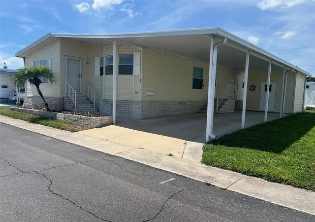 1st image of 12 Thatch Palm St W, Largo, FL 33770 | MLS# TB8515493