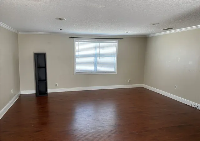 Photo 4 of Single family home for sale at 313 S Observatory Dr, Orlando, FL 32835 | MLS# O6413628 | Listing updated on 2026-10-06