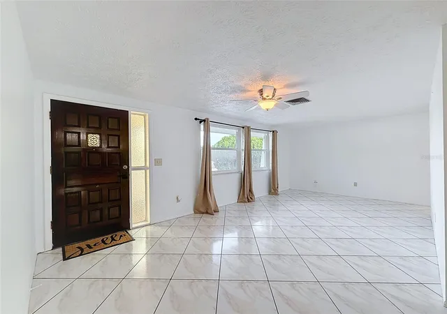 Photo 3 of Single family home for sale at 8846 Carmen Ln, Port Richey, FL 34668 | MLS# W7886392 | Listing updated on 2026-10-02