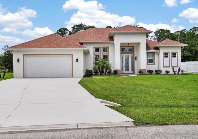 Photo 1 of Single family home for sale at 19 Westchester Ln, Palm Coast, FL 32164 | MLS# O6413661 | Listing updated on 2026-09-29