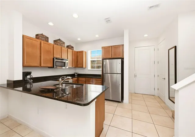 Photo 4 of Townhouse for sale at 2606 Roadster Ln, Kissimmee, FL 34746 | MLS# O6413741 | Listing updated on 2026-09-02