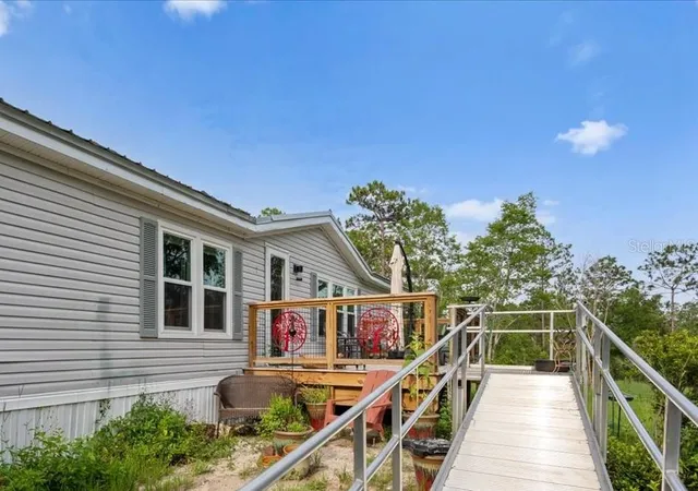 Photo 3 of Manufactured home for sale at 7220 NE 24th Loop, High Springs, FL 32643 | MLS# GC540913 | Listing updated on 2026-09-25